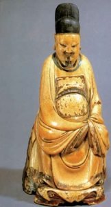 Ming Dynasty ivory carving, human figure, 20 cm high, housed in Shanghai Museum